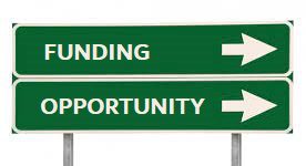 Funding Opportunity road sign
