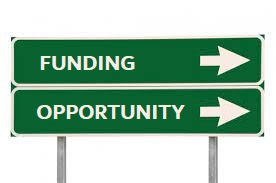 Funding Opportunity road sign